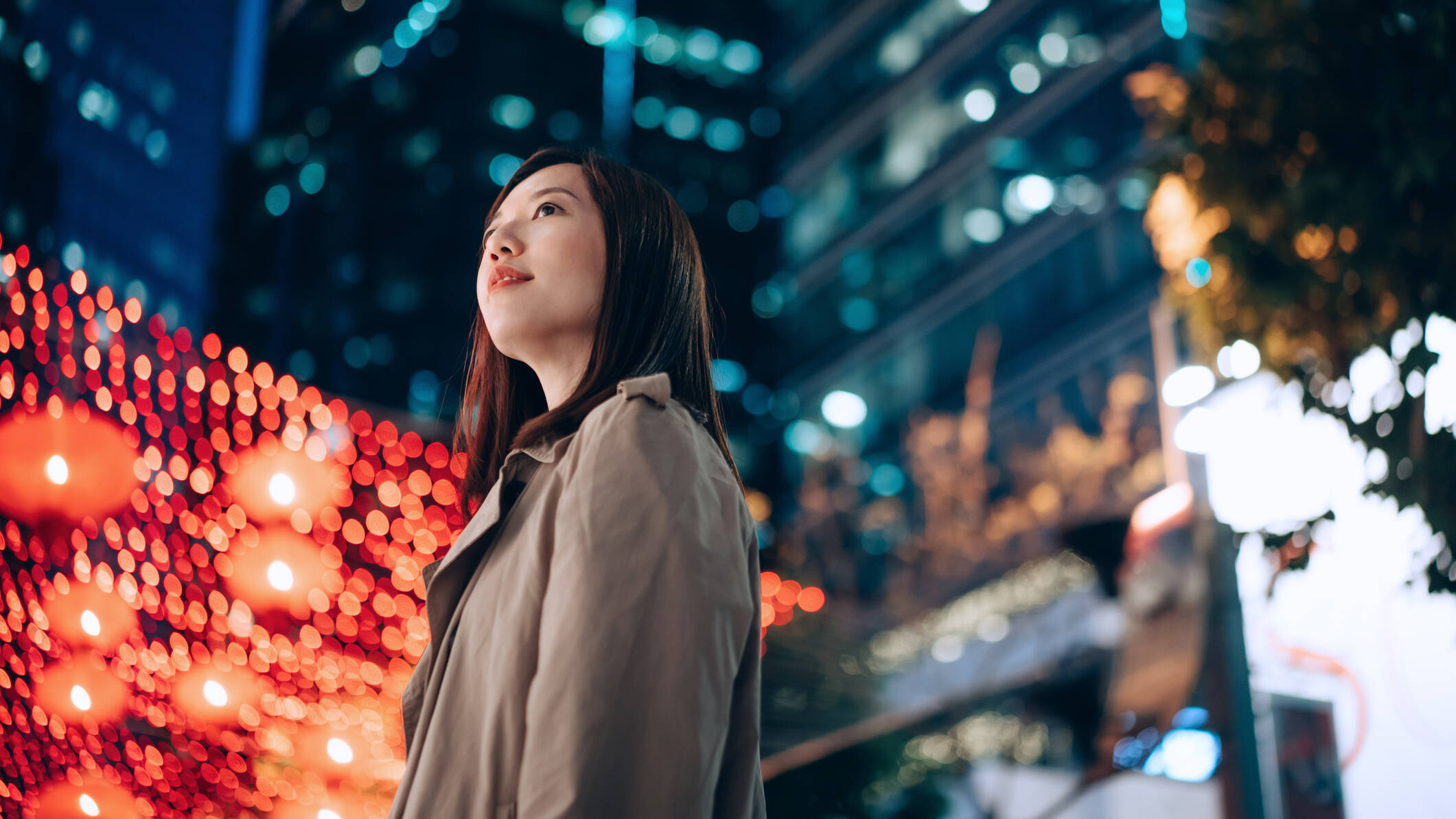 woman in city at night