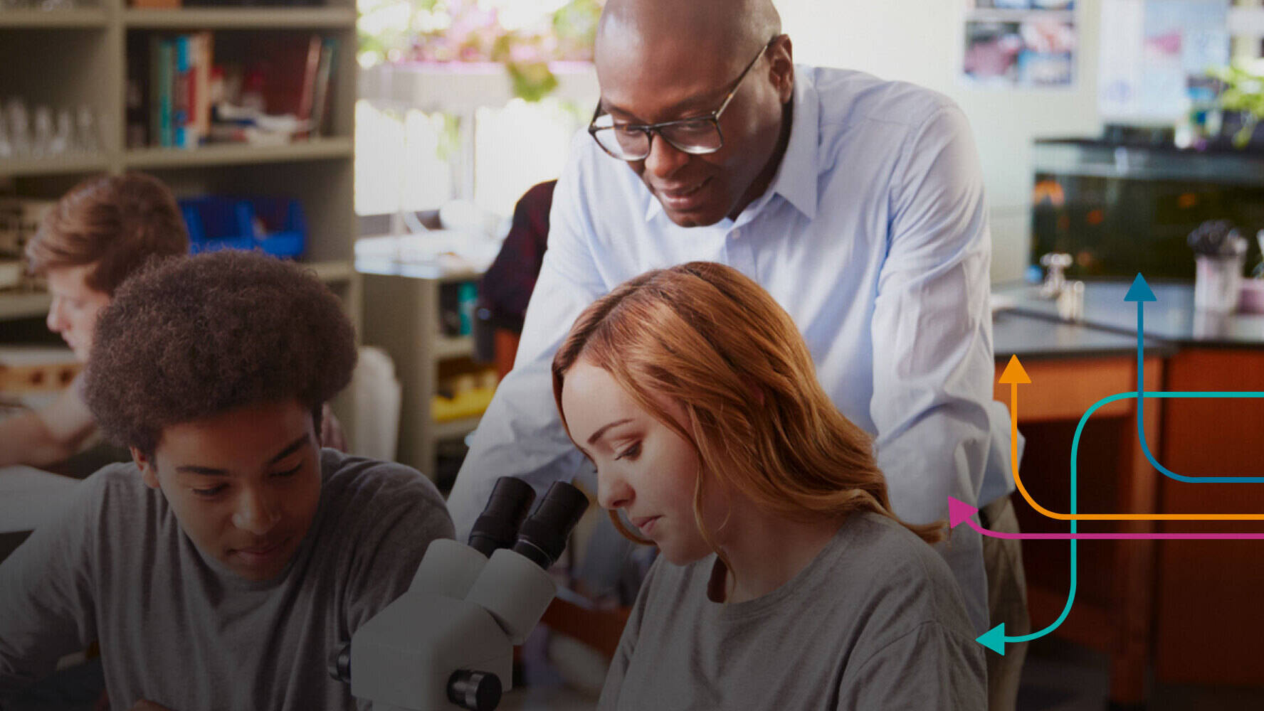 Teachers and students in a classroom.