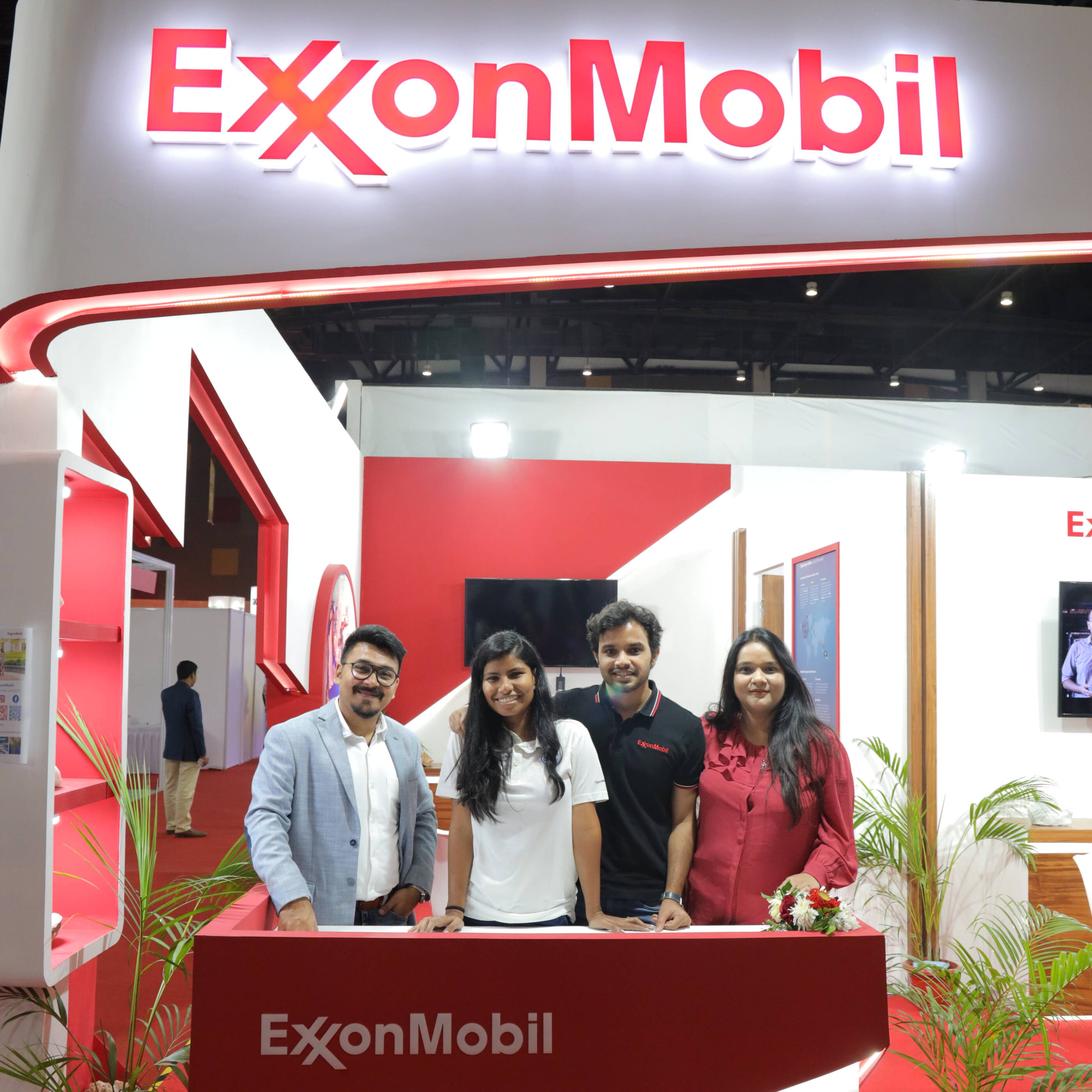 employees in a conference booth