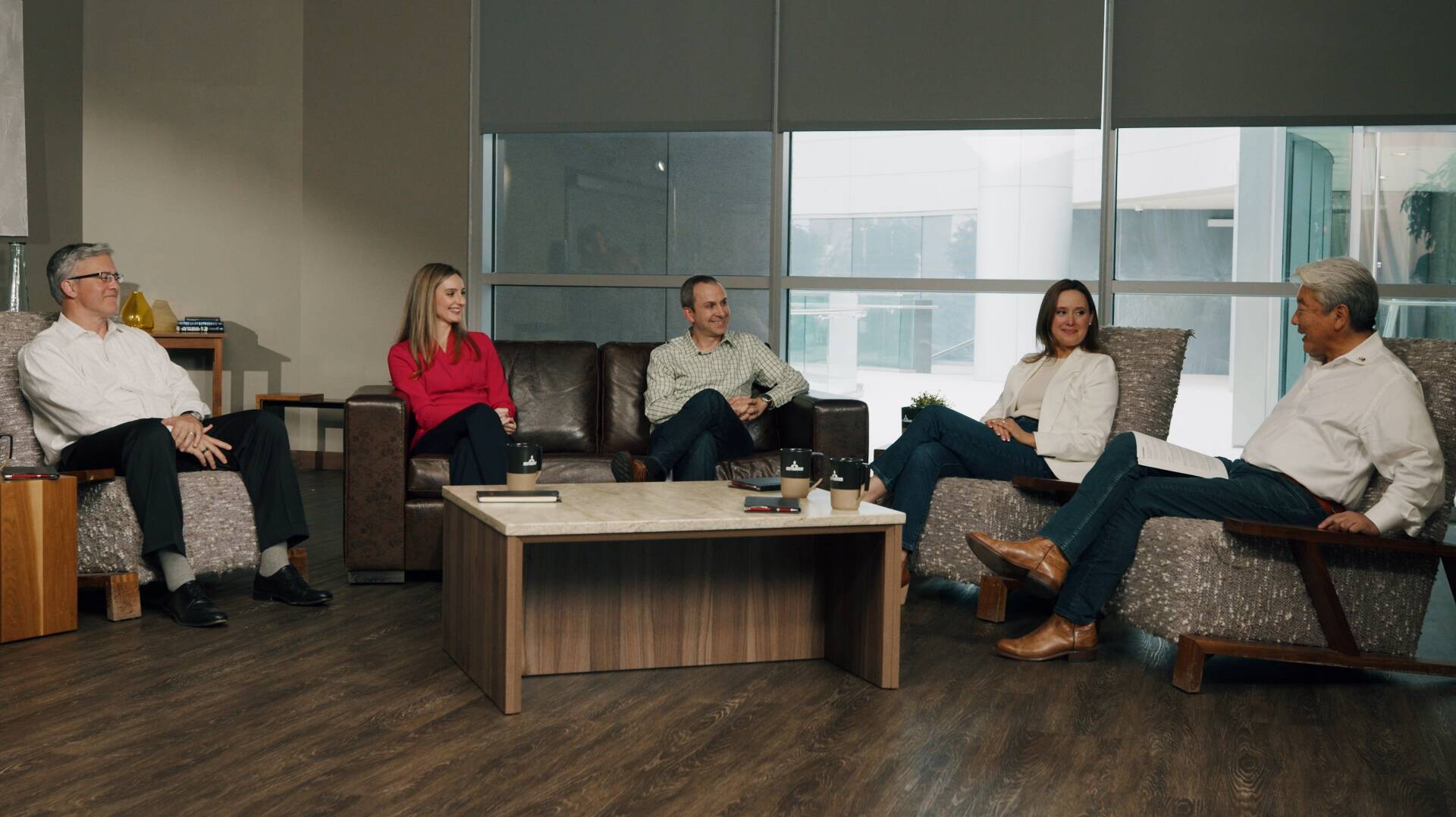 Group of five professionals and politicians sit together to discuss reducing America's emissions.