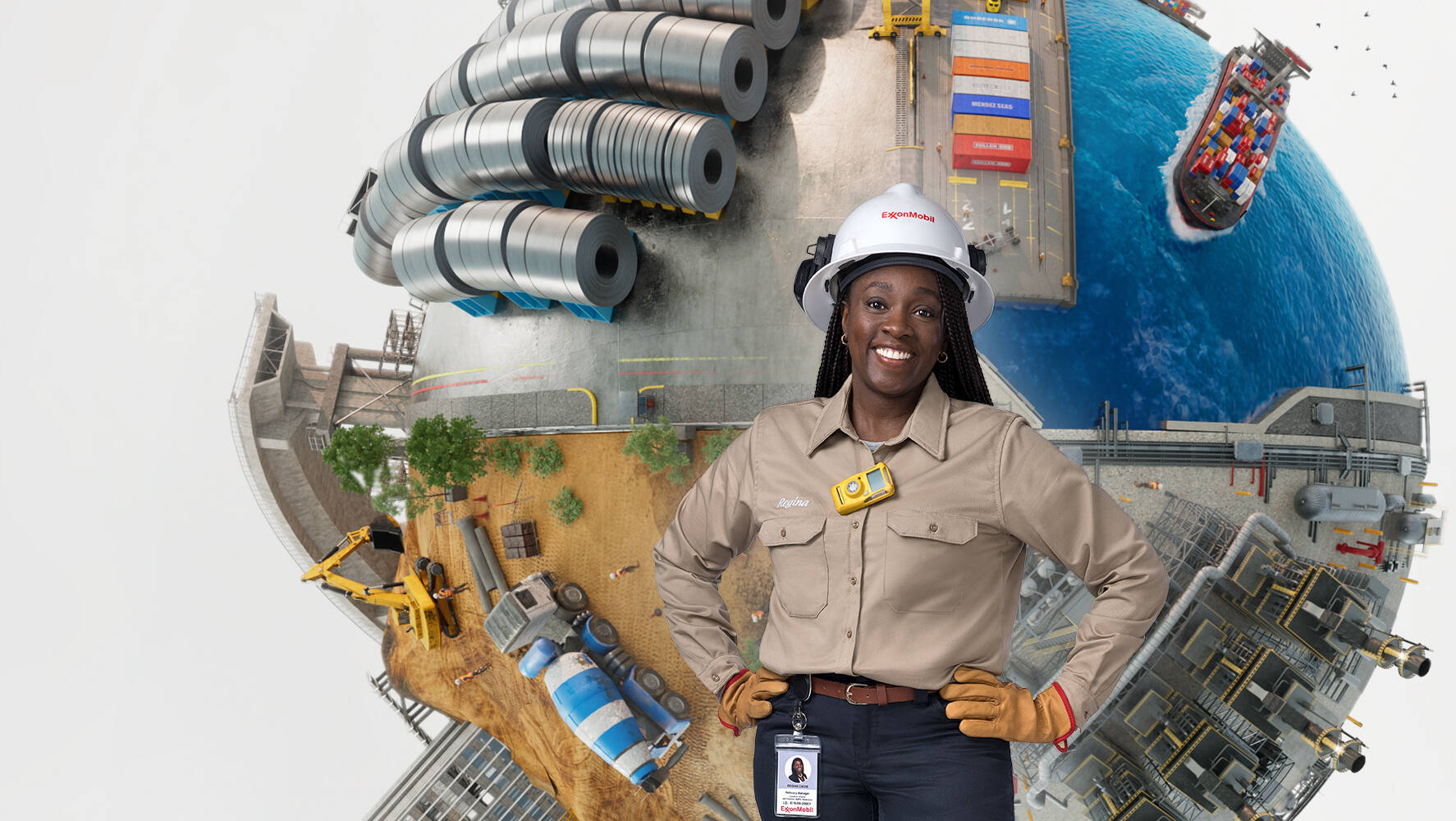 Female employee wearing hard hat in front of world of industry globe