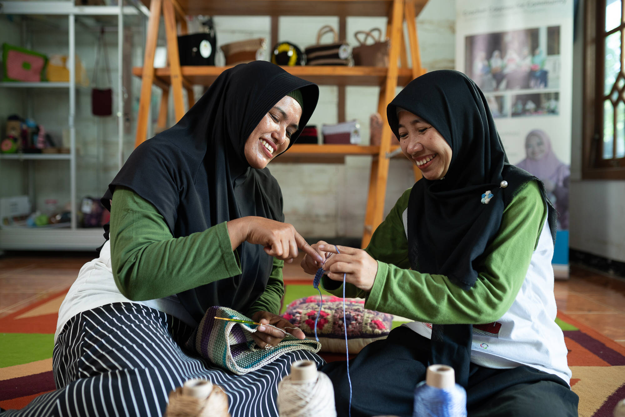 2022 - Two women knitting in Bojonegoro PRIMA program